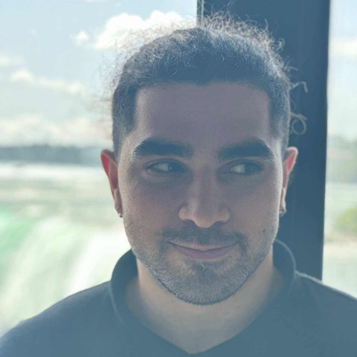 Portrait of Erfan Miahi, Founding Research Engineer · Covenant AI